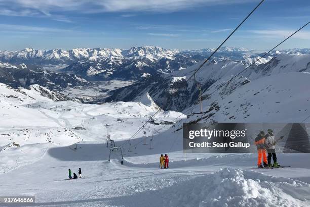 Visitors ride a ski lift up a glacier on Kitzsteinhorn mountain at the Kaprun ski resort in the Austrian Alps on February 5, 2018 near Kaprun,...
