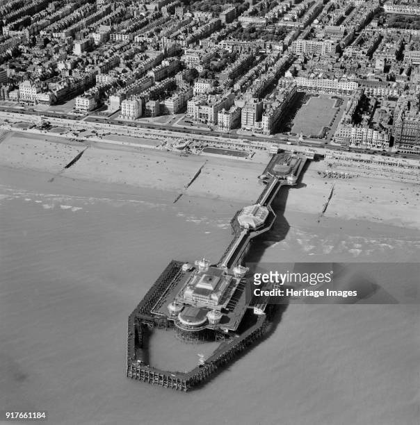 The West Pier, Brighton, Sussex, 1952. Designed by Eugenius Birch, Brighton's West Pier opened in 1866, but closed in 1975 since when it has...