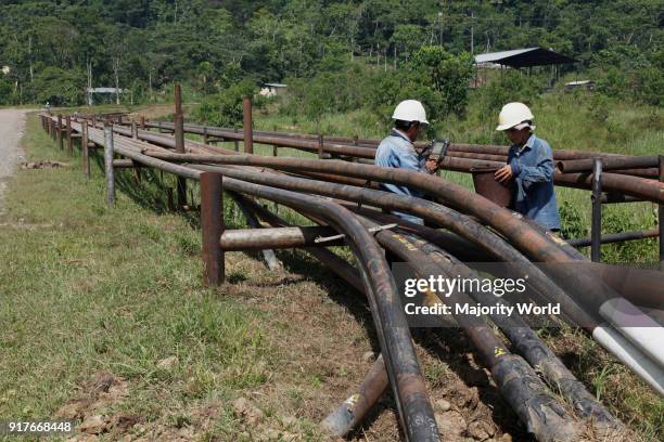 Oil extraction and pollution in the Amazon Huaorani Amerindians trying to survive through eco-tourism against the threat of oil multinationals....