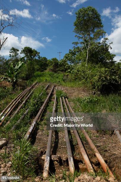 Oil extraction and pollution in the Amazon Huaorani Amerindians trying to survive through eco-tourism against the threat of oil multinationals....