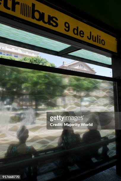 Bus stop at Avenida 9 de Julio in Buenos Aires, Argentina.