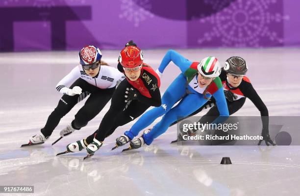 Minjeong Choi of Korea, Chunyu Qu of China, Martina Valcepina of Italy and Petra Jaszapati of Hungary compete during the Ladies' 500m Short Track...