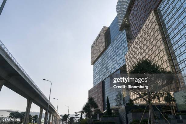 The MGM Cotai casino resort, developed by MGM China Holdings Ltd., right, stands near to an overpass in Macau, China, on Tuesday, Feb. 13, 2018. MGM...