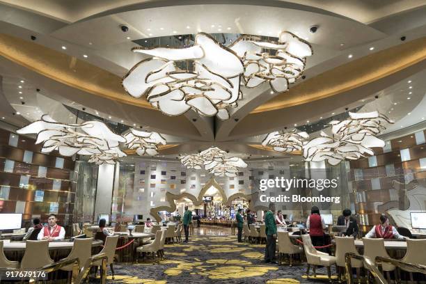 Blackjack tables stand on the gaming floor of the casino at the MGM Cotai casino resort, developed by MGM China Holdings Ltd., in Macau, China, on...