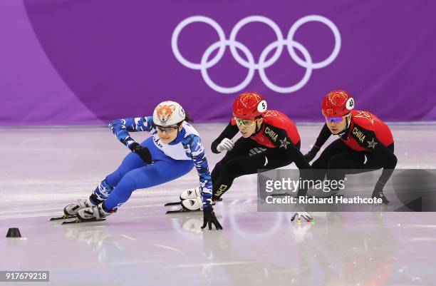Sofia Prosvirnova of Olympic Athlete from Russia, Kexin Fan of China, Yutong Han of China compete during the Ladies' 500m Short Track Speed Skating...