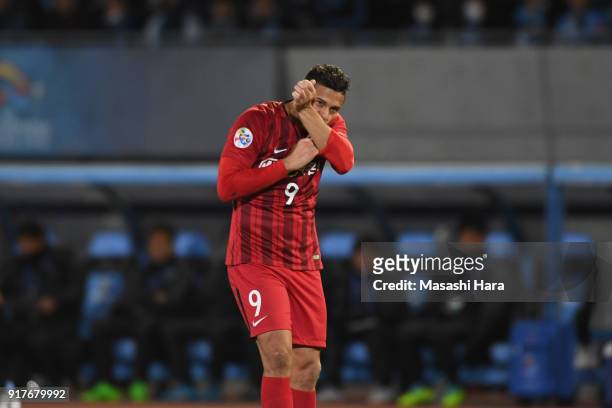 Elkeson of Shanghai SIPG celebrates scoring the opening goal during the AFC Champions League Group F match between Kawasaki Frontale and Shanghai...