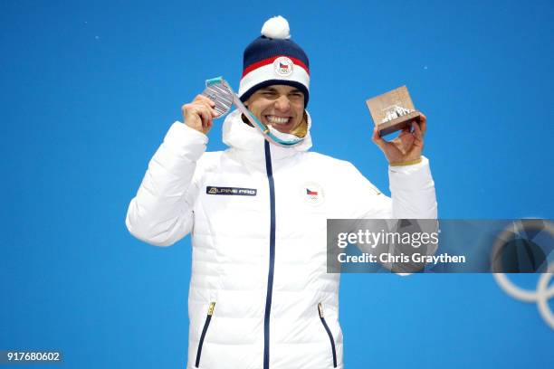 Silver medalist Michal Krcmar of the Czech Republic poses during the medal ceremony for the Men's 10km Sprint Biathlon on day four of the PyeongChang...