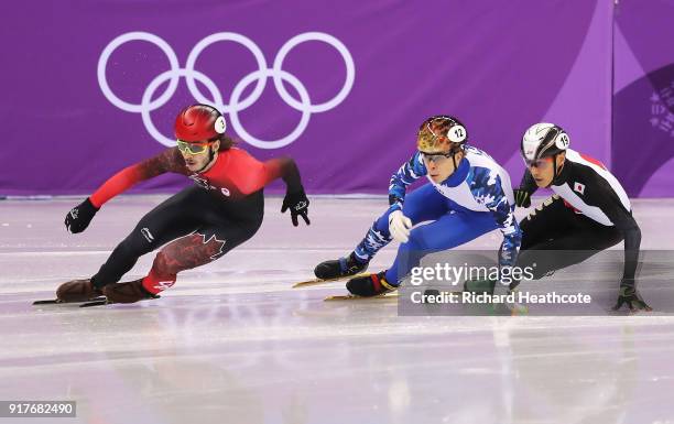 Samuel Girard of Canada, Semen Elistratov of Olympic Athlete from Russia, Keita Watanabe of Japan compete during the Men's 1000m Short Track Speed...