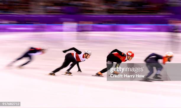 Sjinkie Knegt of the Netherlands, Thibaut Fauconnet of France, Roberts Janis Zvejnieks of Latvia, Ziwei Ren of China compete during the Men's 1000m...