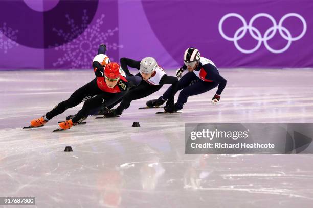 Ziwei Ren of China, Sjinkie Knegt of the Netherlands, Thibaut Fauconnet of France, Roberts Janis Zvejnieks of Latvia compete during the Men's 1000m...