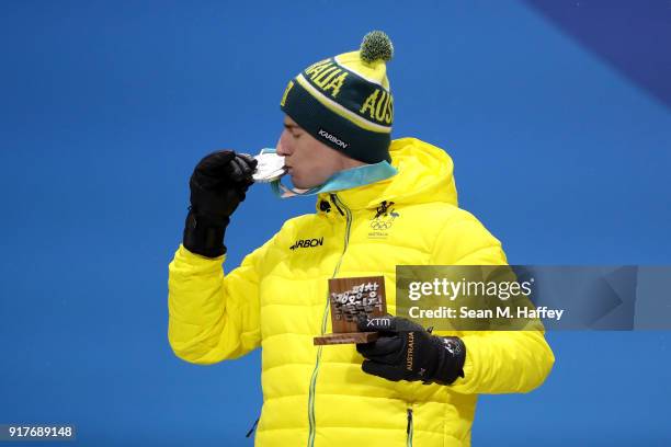 Silver medalist Matt Graham of Australia poses during the medal ceremony for the Freestyle Skiing Men's Moguls on day four of the PyeongChang 2018...