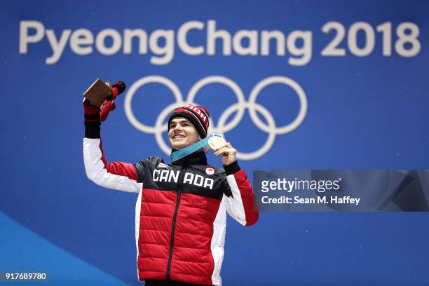 Gold medalist Mikael Kingsbury of Canada poses during the medal ceremony for the Freestyle Skiing Men's Moguls on day four of the PyeongChang 2018...