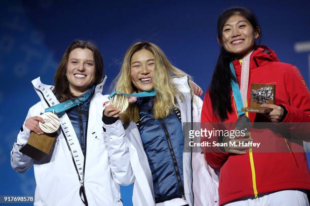 Bronze medalist Arielle Gold of the United States, gold medalist Chloe Kim of the United States and silver medalist Jiayu Liu of China pose during...