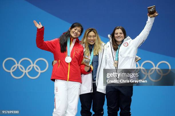 Silver medalist Jiayu Liu of China, gold medalist Chloe Kim of the United States and bronze medalist Arielle Gold of the United States pose during...