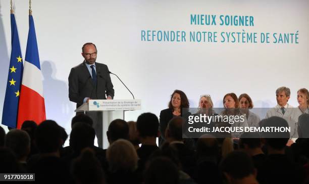 French Prime Minister Edouard Philippe speaks, as French Minister of Solidarity and Health Agnes Buzyn listens, during the presentation of the...