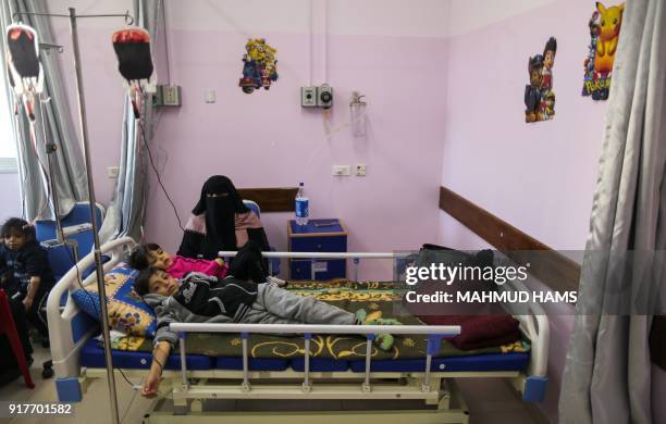 Palestinian children suffering from cancer receive treatment at a hospital in Gaza City on February 13, 2018. A senior United Nations official in...