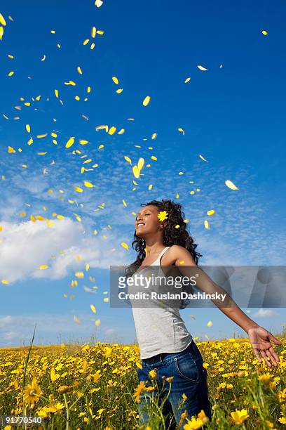 yellow petals fall - ethiopian models women stock pictures, royalty-free photos & images
