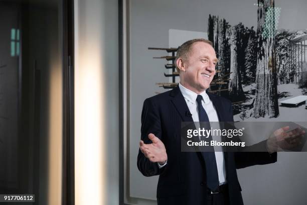 Francois-Henri Pinault, chief executive officer of Kering SA, gestures during a Bloomberg Television interview following the announcement of the...