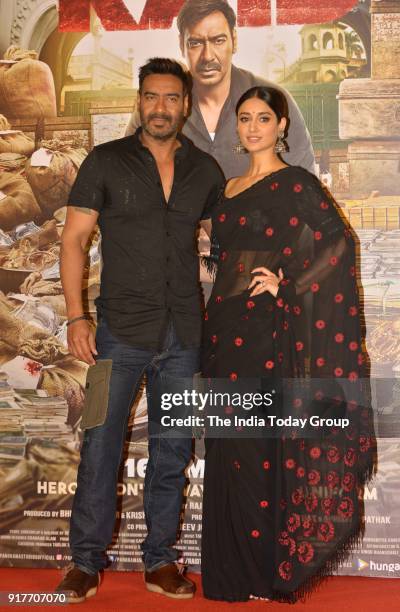 Ajay Devgan and Ileana D'Cruz during the trailer launch of the film Raid in Mumbai.