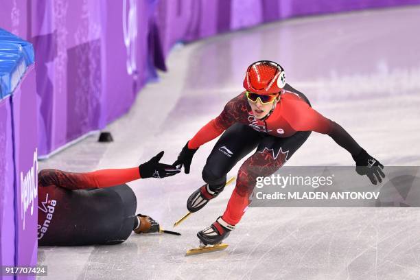 Canada's Charle Cournoyer competes in the men's 5,000m relay short track speed skating heat event during the Pyeongchang 2018 Winter Olympic Games,...