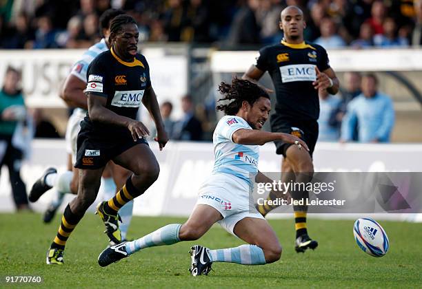 Wasps' Serge Betsen chases Racing Metro's Mani Vakaola during the Amlin Challenge Cup match between London Wasps and Racing Metro 92 at the Causeway...