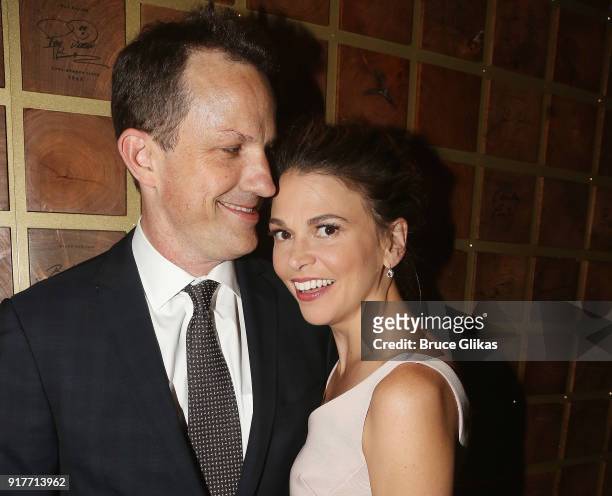 Ted Griffin and wife Sutton Foster pose at the "Thoroughly Modern Millie" 15th Anniversary Reunion Concert After Party at Opry City Stage on February...