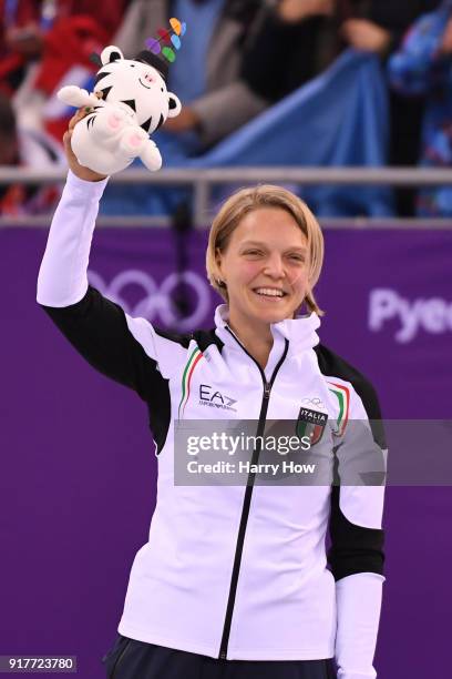 Gold medalist Arianna Fontana of Italy celebrates during the victory ceremony after the Ladies' 500m Short Track Speed Skating final on day four of...