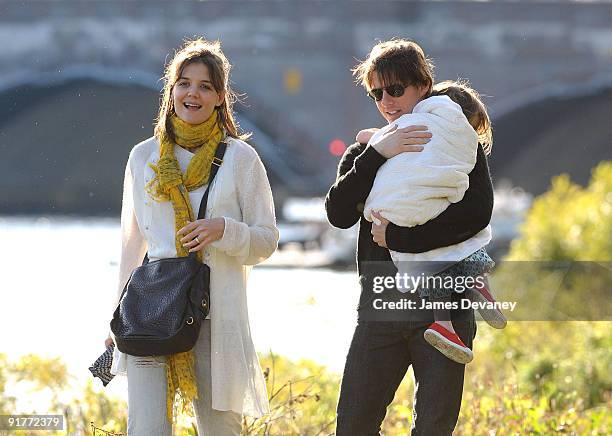 Katie Holmes, Suri Cruise and Tom Cruise visit Charles River Basin on October 10, 2009 in Cambridge, Massachusetts.