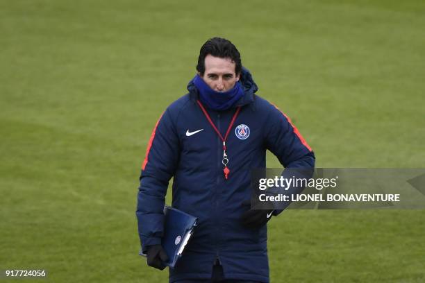 Paris Saint-Germain's Spanish headcoach Unai Emery attends a training session at in Saint-Germain-en-Laye, on February 13, 2018 on the eve of the...