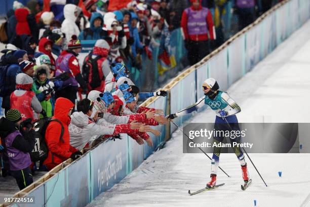 Stina Nilsson of Sweden celebrates winning gold during the Cross-Country Ladies' Sprint Classic Final on day four of the PyeongChang 2018 Winter...