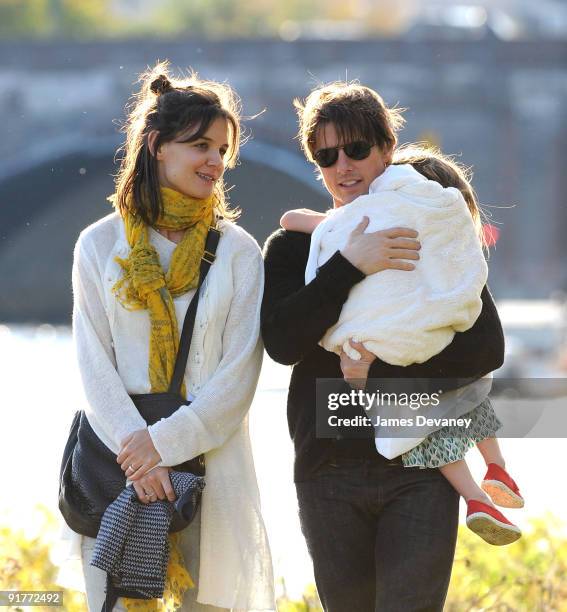 Katie Holmes, Suri Cruise and Tom Cruise visit Charles River Basin on October 10, 2009 in Cambridge, Massachusetts.