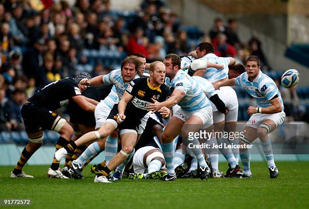 Wasps' Joe Simpson passes the ball out from the scrum during the Amlin Challenge Cup match between London Wasps and Racing Metro 92 at the Causeway...
