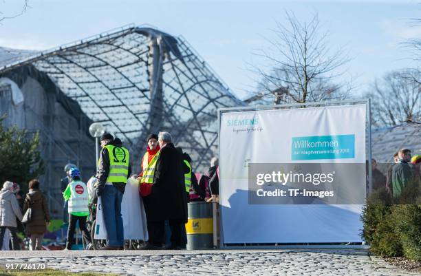 Demonstration groups are seen prior to the Siemens annual general shareholders' meeting at Olympic Hall on January 31, 2018 in Munich, Germany.