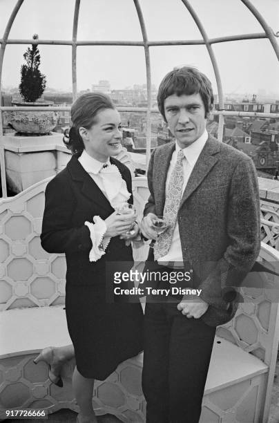 German-French actress Romy Schneider and British actor Tom Courtenay, both starring in comedy thriller film 'Otley', UK, 4th March 1968.