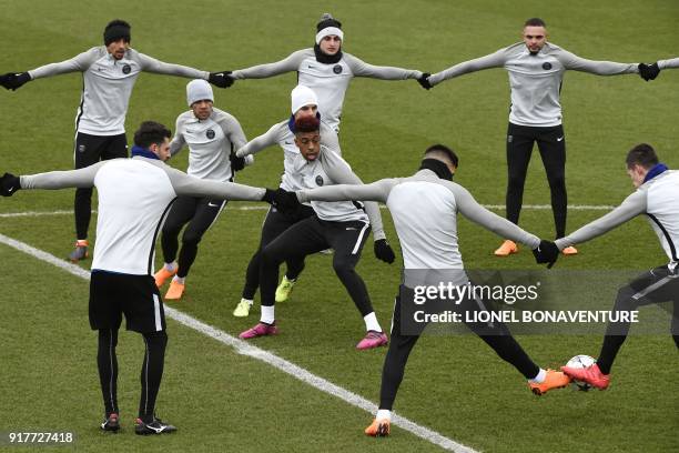 Paris Saint-Germain's players take part in a training session at in Saint-Germain-en-Laye, on February 13, 2018 on the eve of the Champions' League...