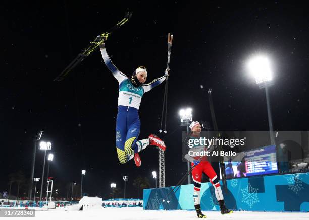 Gold medalist Stina Nilsson of Sweden celebrates winning during the Cross-Country Ladies' Sprint Classic Final on day four of the PyeongChang 2018...