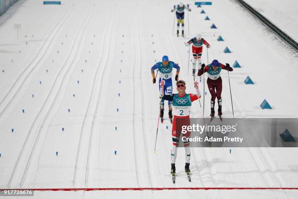Johannes Hoesflot Klaebo of Norway celebrates winning gold during the Cross-Country Men's Sprint Classic Final on day four of the PyeongChang 2018...