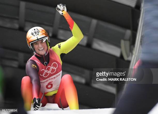 Germany's Natalie Geisenberger celebrates after winning the gold in the women's luge singles final run 4 during the Pyeongchang 2018 Winter Olympic...