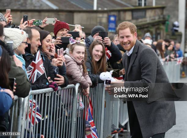 Prince Harry meets well wishers during a walkabout on the esplanade at Edinburgh Castle on February 13, 2018 in Edinburgh, Scotland.