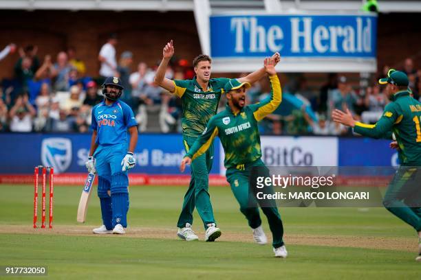 South Africa fielder JP Duminy celebrates catching out on a ball by South Africa bowler Morne Morkel India batsman Virat Kohli during the fifth One...