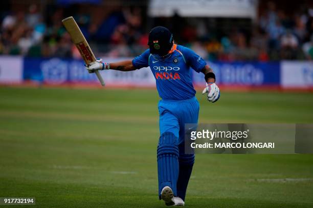 India batsman Virat Kohli reacts as he leaves the ground after having been caught out by South Africa fielder JP Duminy on a ball by South Africa...