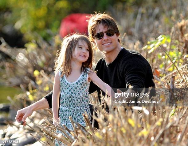 Suri Cruise and Tom Cruise visit Charles River Basin on October 10, 2009 in Cambridge, Massachusetts.