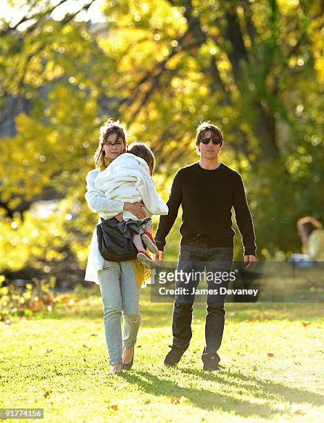 Katie Holmes, Suri Cruise and Tom Cruise visit Charles River Basin on October 10, 2009 in Cambridge, Massachusetts.