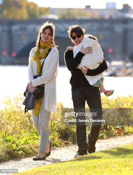 Katie Holmes, Suri Cruise and Tom Cruise visit Charles River Basin on October 10, 2009 in Cambridge, Massachusetts.