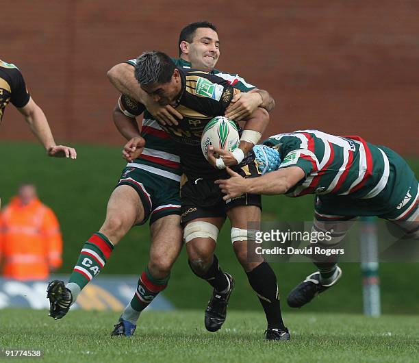 Jerry Collins of the Ospreys is tackled by Jeremy Staunton during the Heineken Cup match between Leicester Tigers and Ospreys at Welford Road on...