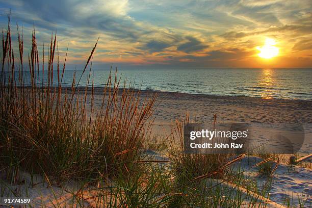 beautiful sunset - seen great lakes stock-fotos und bilder