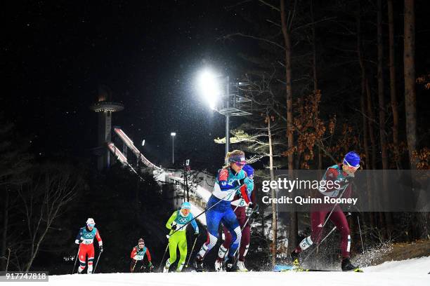 Yulia Belorukova of Olympic Athlete from Russia leads Jessica Diggins of the United States during the Cross-Country Ladies' Sprint Classic Semifinal...