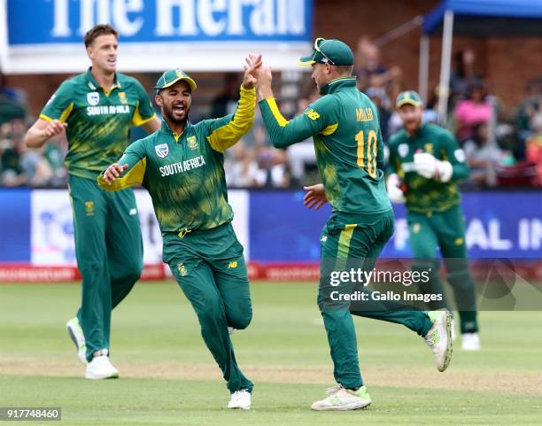 Duminy and David Miller of South Africa celebrate the taking of Virat Kohli of India's wicket during the 5th Momentum ODI match between South Africa...