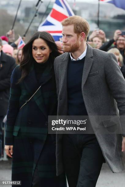 Prince Harry and Meghan Markle are seen during a walkabout on the esplanade at Edinburgh Castle on February 13, 2018 in Edinburgh, Scotland.