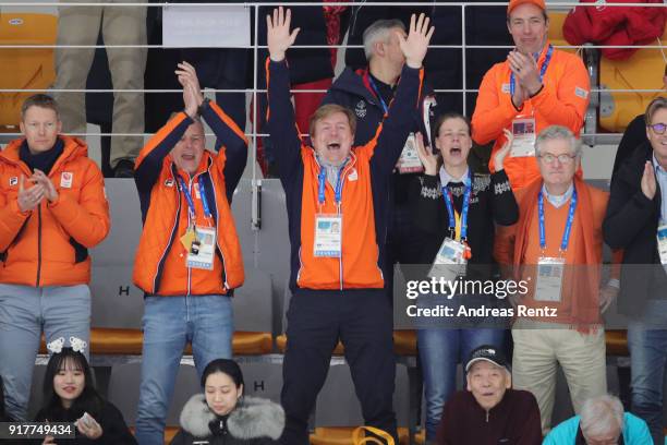 King Willem-Alexander of the Netherlands celebrates the Gold medal of Kjeld Nuis of the Netherlands during the Men's 1500m Speed Skating on day four...